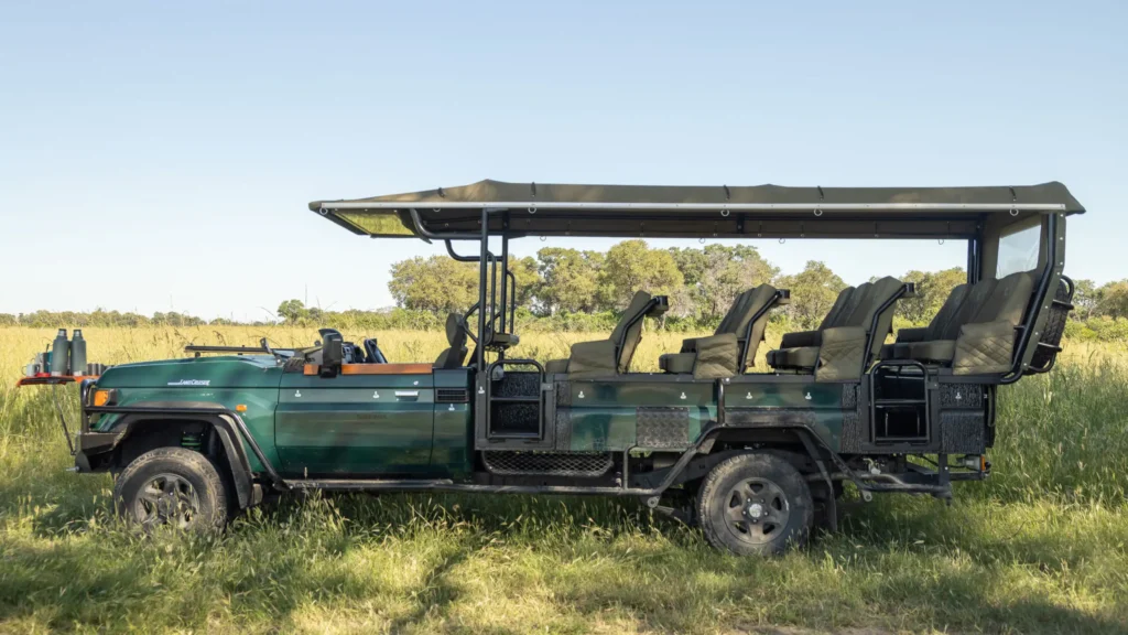Side view of the comfortable UNTOUCHED Safaris game viewer in the Khwai region, designed for an immersive safari experience.
